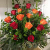 One sided design of Orange and Red 18 
roses , mixed with