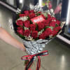 Photo is Deluxe of 24 Roses...
You may request change in colors during