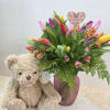 20 assorted tulips, mixed alstromaria in a charming frosted vase, paired with