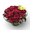 Two dozen premium red roses arranged in a tight pav&eacute; design. A