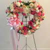 Heart shaped funeral wreath in pink and white roses and much more