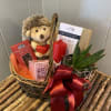 This Valentines Day inspired gift basket features designer's choice items, sourced by