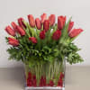 Love tulips? This arrangement is sure to make someone very happy. 20