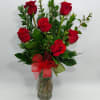 6 premium red roses with greens arranged in a vase