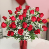 24 Red Ecuadorian long stem roses in a red shimmer vase with