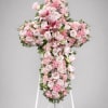 The Pink Cross Standing Spray is a beautiful tribute designed to offer