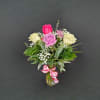 6 beautiful assorted color roses arranged in a vase with baby's breath