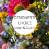 Trust our designers to create a beautiful, low and lush arrangement for