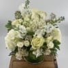 Indulge in the delicate beauty of the "Vanilla Blossom" arrangement, a luxurious