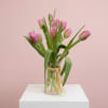 Gift this gorgeous and classic arrangement, featuring some specialty tulips to yourself