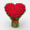 A timeless heart arrangement of red roses, perfect for grand romantic gestures.