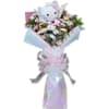 This sweet bouquet features soft pastel flowers and fresh greenery, beautifully wrapped