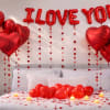 This Valentine&rsquo;s Day Romantic Night Decoration Setup includes striking red foil balloons