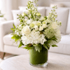 The Palos Verdes Arrangement is a mix of white and green florals