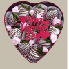 1 dozen chocolate covered strawberries in Valentine colors packed in a heart