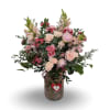 Happily Ever After is a romantic, garden-style arrangement filled with soft blush