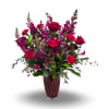 Moody Valentine is a bold and romantic arrangement designed to make a