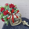 Gold heart lock with key table centerpiece with velvet red roses topped