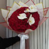 100 roses carefully wrapped and tied with a satin ribbon. Orchid add