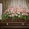 An elegant display of pink roses and white flowers, showcasing a harmonious