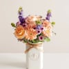 Get them buzzing with our charming bouquet! A garden-fresh gathering of blooms