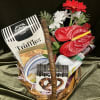 Imagine a charming small flower and snack gift basket, a delightful combination