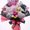 This fun and feminine balloon bouquet features a playful mix of pink