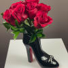 Step into style with our most requested floral arrangement! This chic, high-fashion
