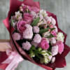 Add a touch of beauty to any occasion with this enchanting bouquet