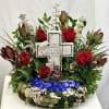 Perfect tribute to a fisherman filled with red Ecuadorian Roses, blue Hydrangeas