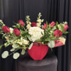 Blooming box with red roses 