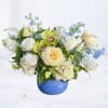 Elegant and serene, the Bluebell arrangement is a sophisticated floral tribute perfect