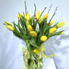 20 Tulips vased accented with pussy willow. 
Choose from yellow, pink, purple