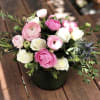 - 8 White Roses
- 8 Pink Ranunculus
- Greenery
- 6 x 6 Inches