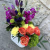 orange roses, yellow carnations, purple tulips, green hydrangea