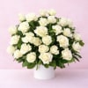 oft, timeless, and effortlessly elegant. This lush arrangement of premium white roses