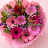 This bouquet is bright, romantic, and full of texture 

It features a