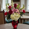 A lovely vase arrangement showcasing lilies, snapdragons, roses, alstroemerias, and hydrangeas.