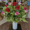 A luxury dozen roses, designed in a tall ceramic vase. Customize your