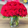 Elegant and timeless, this beautiful arrangement features fresh premium red roses accented