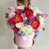 This exquisite floral arrangement is a stunning composition that exudes luxury and