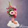 Kowgirl Kourtney is cute in a boot! A Gerbera daisy, snapdragon, a