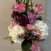 This elegant garden vase arrangement features fresh pink roses, hydrangeas, chrysanthemums and