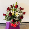 Beautiful Ecuadorian Red roses with a nice oriental lilies designed in a