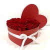Preserved roses in a heart shaped box. Placed in a vase or