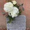 Your Memory Stone on wrought iron stand embellished with fresh hydrangea, eucalyptus