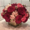 STANDARD 
4x4" glass cube with 9 Roses, Spray Roses, Wax Flower and