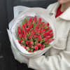 A refined bouquet of fresh red tulips, symbolizing deep love, warmth, and