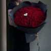 100 premium red roses in elegant black wrap &mdash; a bold symbol