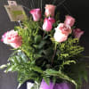 Traditional bouquet style dozen roses in glass vase. Red, white, lavender or